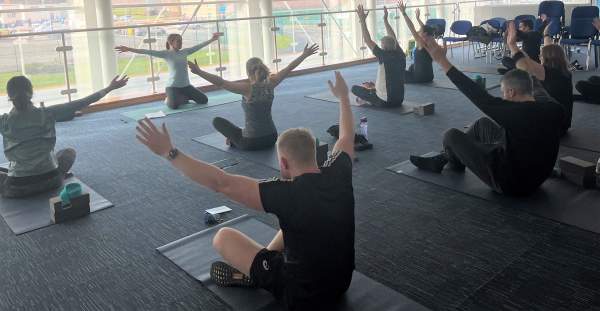 <p><strong>A moment of zen</strong><br>Employees taking advantage of the free on site yoga classes.</p>